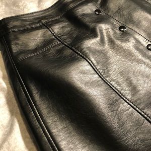 Black faux leather mini skirt with buttons